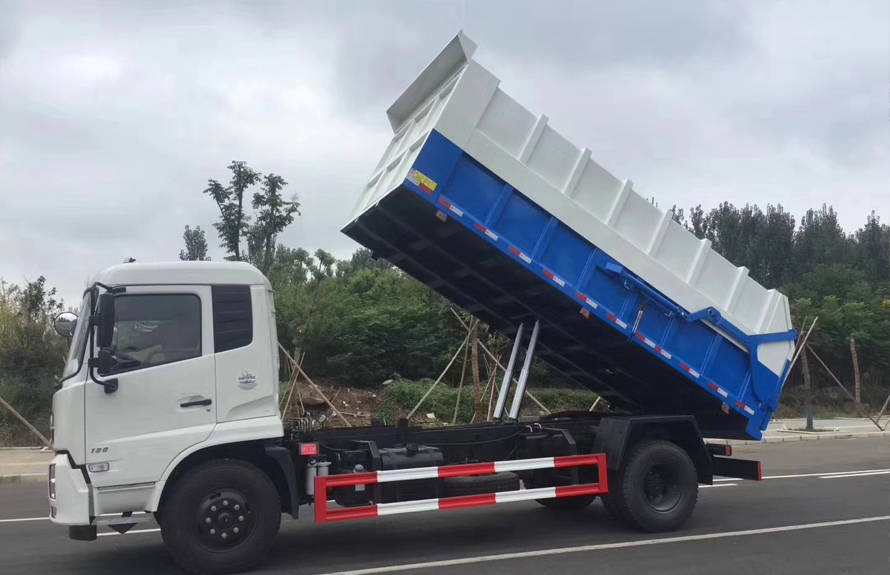 12方東風(fēng)天錦壓縮式對(duì)接垃圾車(chē)圖片2